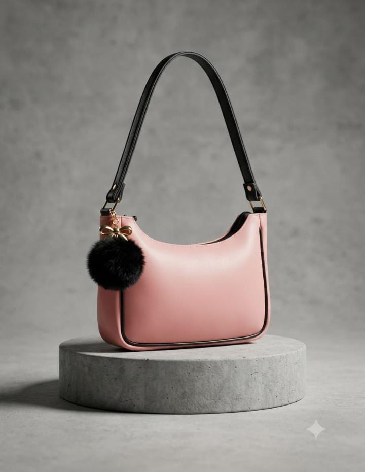 Chic Minimalist Crescent Shoulder Bag with Fur Charm —   handbag by HandbagsAvenue